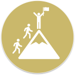 Group of climbers reaching a mountain summit; a figure on top raises a flag.